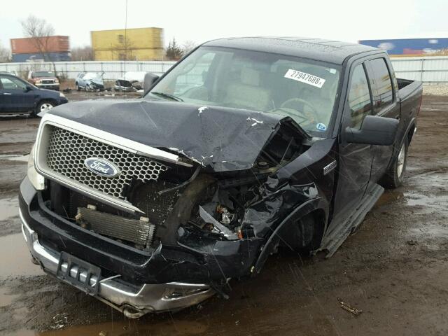 1FTPW14524KD44058 - 2004 FORD F150 SUPER BLACK photo 2