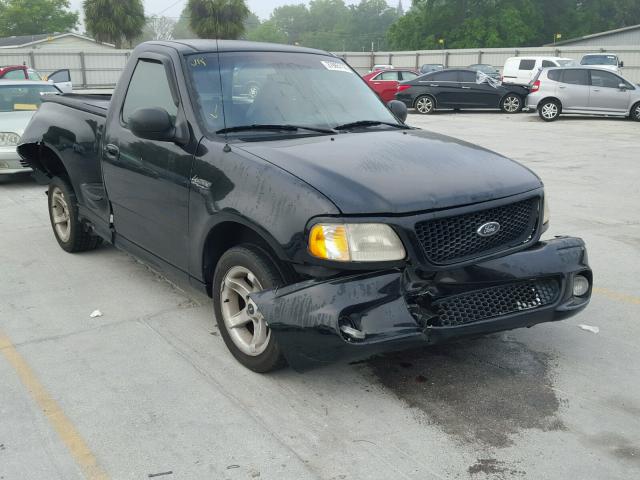 2FTZF0732XCB04322 - 1999 FORD F150 SVT L BLACK photo 1