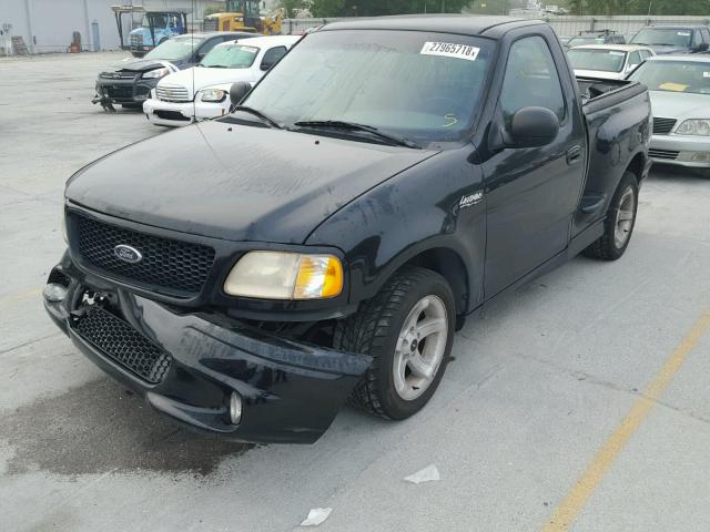 2FTZF0732XCB04322 - 1999 FORD F150 SVT L BLACK photo 2