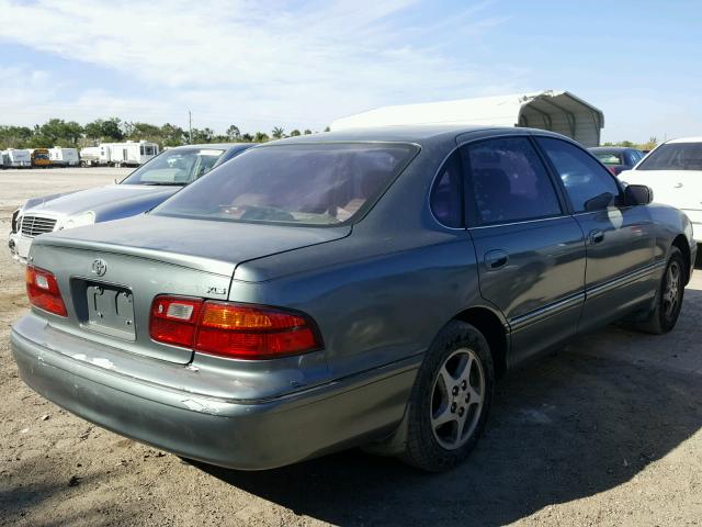 4T1BF18B9XU312951 - 1999 TOYOTA AVALON XL WHITE photo 4