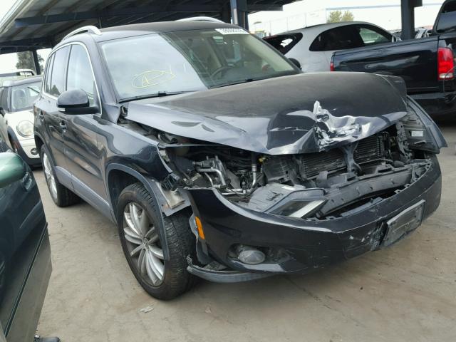 WVGAV7AX1CW510476 - 2012 VOLKSWAGEN TIGUAN S BLACK photo 1