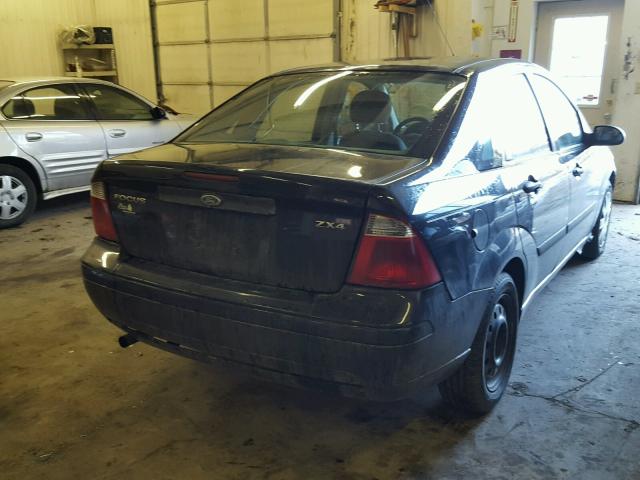 1FAFP34N05W131310 - 2005 FORD FOCUS ZX4 BLACK photo 4