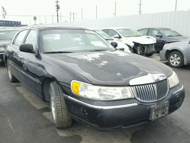 1LNHM82W8XY701464 - 1999 LINCOLN TOWN CAR S BLACK photo 1