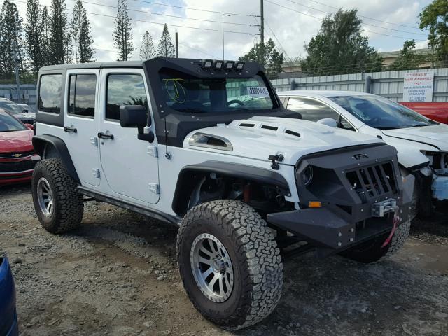 1C4HJWDG0GL265939 - 2016 JEEP WRANGLER U WHITE photo 1