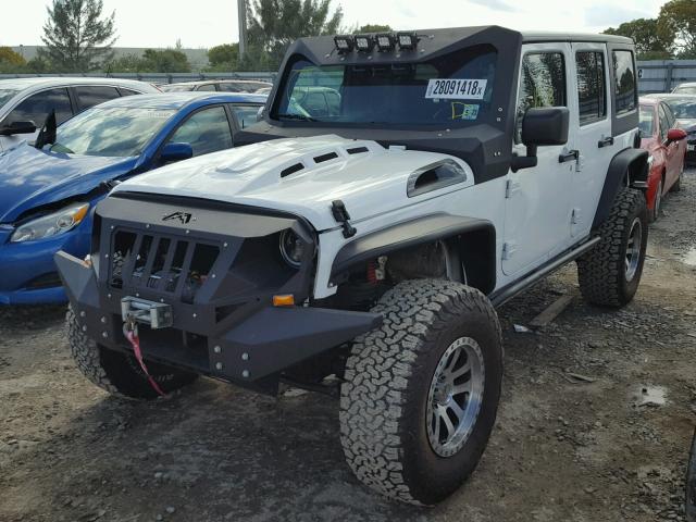 1C4HJWDG0GL265939 - 2016 JEEP WRANGLER U WHITE photo 2