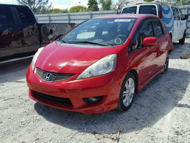 JHMGE88499S021029 - 2009 HONDA FIT SPORT RED photo 2