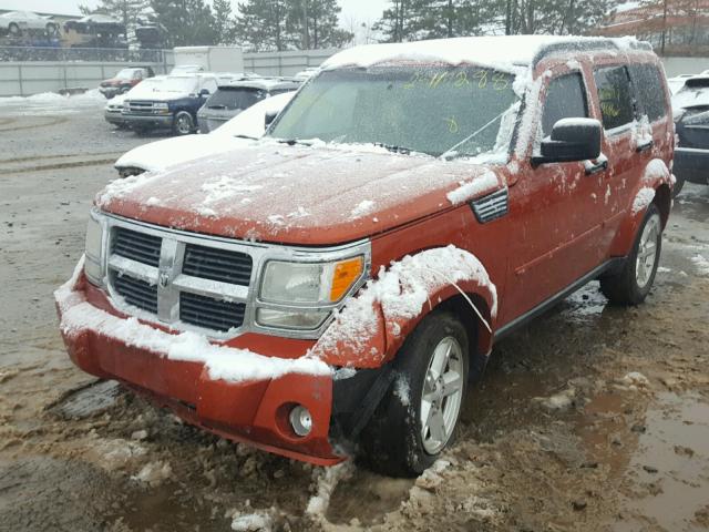 1D8GU58K98W241927 - 2008 DODGE NITRO SLT ORANGE photo 2