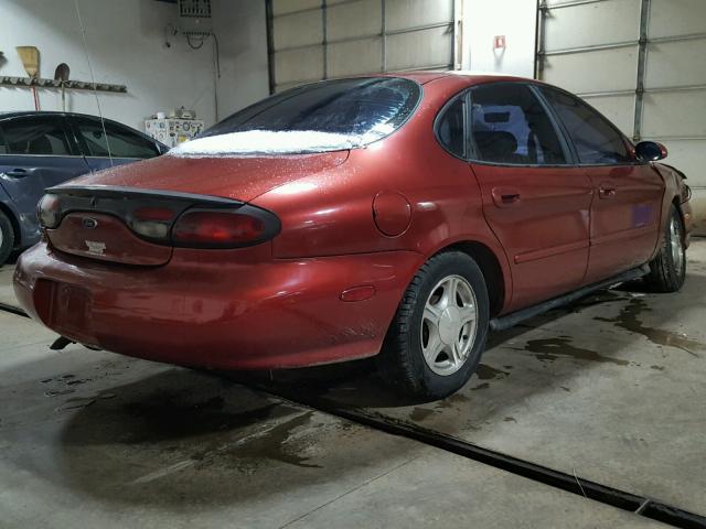 1FAFP53U6XA314909 - 1999 FORD TAURUS SE GREEN photo 4