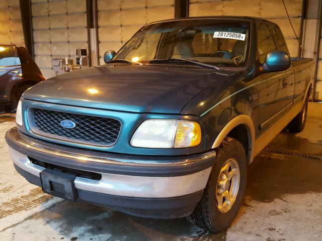 1FTDX176XVKC88540 - 1997 FORD F150 GREEN photo 2