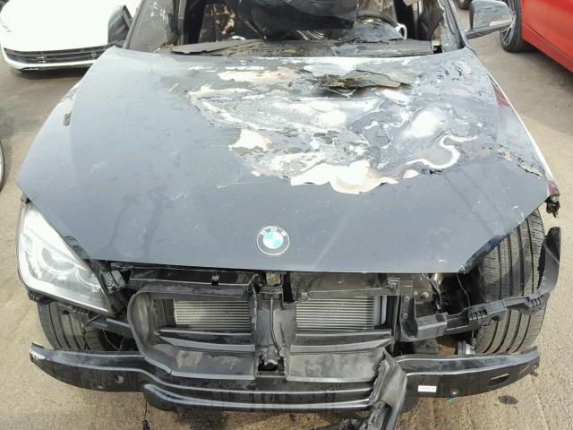 WBAVM1C5XFV315582 - 2015 BMW X1 SDRIVE2 BLACK photo 7