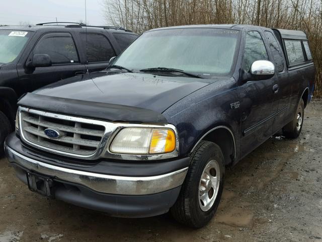 2FTZX1727YCA31427 - 2000 FORD F150 BLUE photo 2