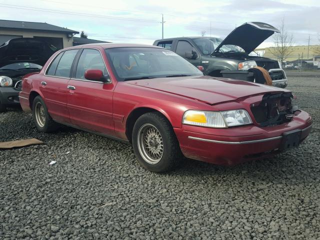 2FAFP74W5YX100997 - 2000 FORD CROWN VICT RED photo 1