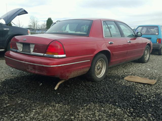 2FAFP74W5YX100997 - 2000 FORD CROWN VICT RED photo 4