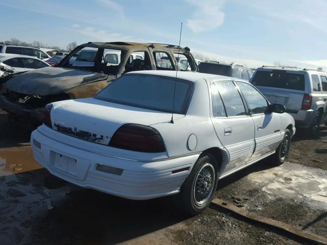 1G2NE54N9PC713521 - 1993 PONTIAC GRAND AM S WHITE photo 4