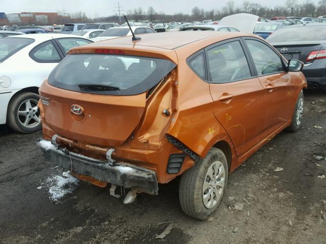 KMHCT5AE2HU321498 - 2017 HYUNDAI ACCENT SE ORANGE photo 4