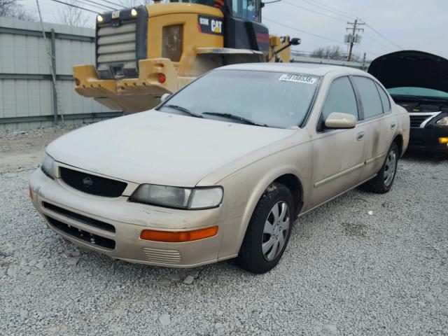 JN1CA21D2ST016793 - 1995 NISSAN MAXIMA GLE GOLD photo 2