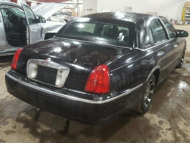 1LNHM81W82Y663468 - 2002 LINCOLN TOWN CAR E BLACK photo 4