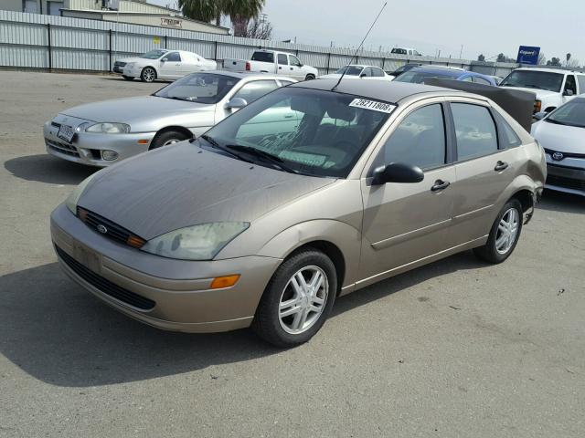 1FAFP34Z84W157431 - 2004 FORD FOCUS SE C TAN photo 2