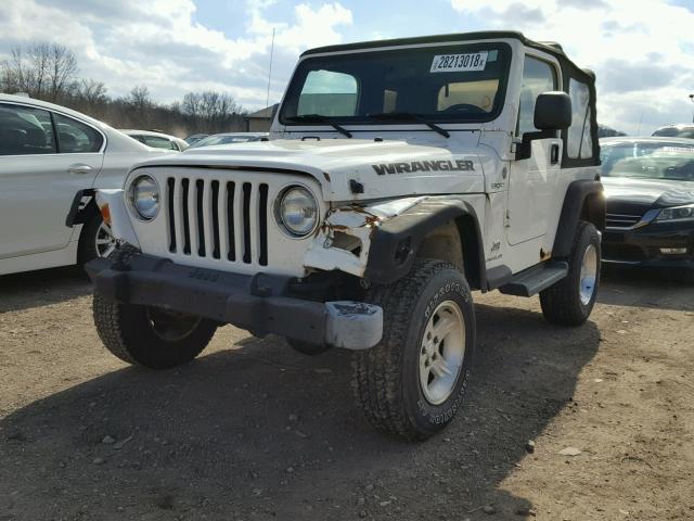 1J4FA49S04P772184 - 2004 JEEP WRANGLER / WHITE photo 2