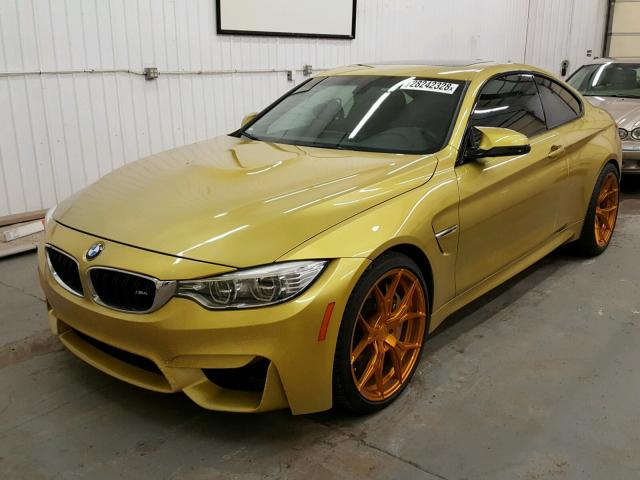 WBS3R9C5XGK336731 - 2016 BMW M4 GOLD photo 2