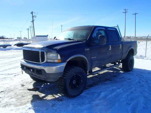 1FTSW31P24ED19221 - 2004 FORD F350 SRW S BLUE photo 2