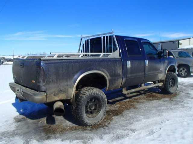 1FTSW31P24ED19221 - 2004 FORD F350 SRW S BLUE photo 4