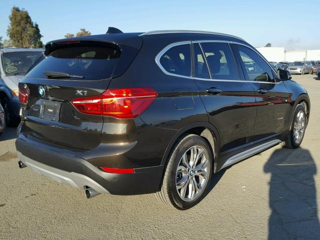 WBXHT3C39G5E54106 - 2016 BMW X1 XDRIVE2 BLACK photo 4