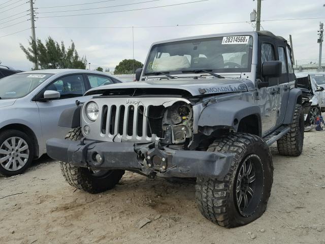 1C4BJWDG8EL118125 - 2014 JEEP WRANGLER U SILVER photo 2