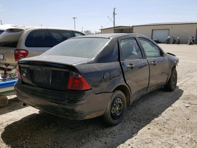 1FAFP34N57W336754 - 2007 FORD FOCUS ZX4 BLACK photo 4