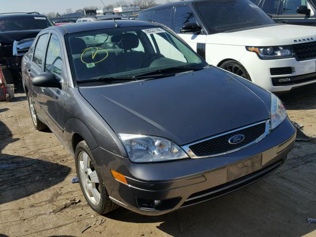 1FAHP34N97W324096 - 2007 FORD FOCUS ZX4 GRAY photo 1