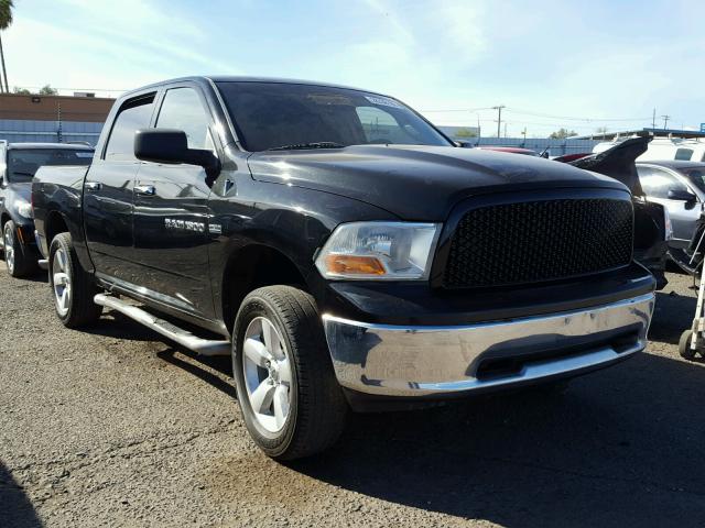 1D7RV1CT4BS584307 - 2011 DODGE RAM 1500 BLACK photo 1