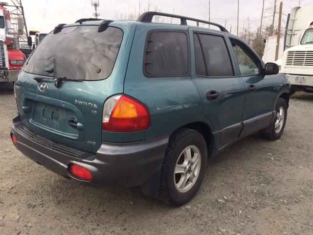 KM8SB73D32U339904 - 2002 HYUNDAI SANTA FE B BLUE photo 4