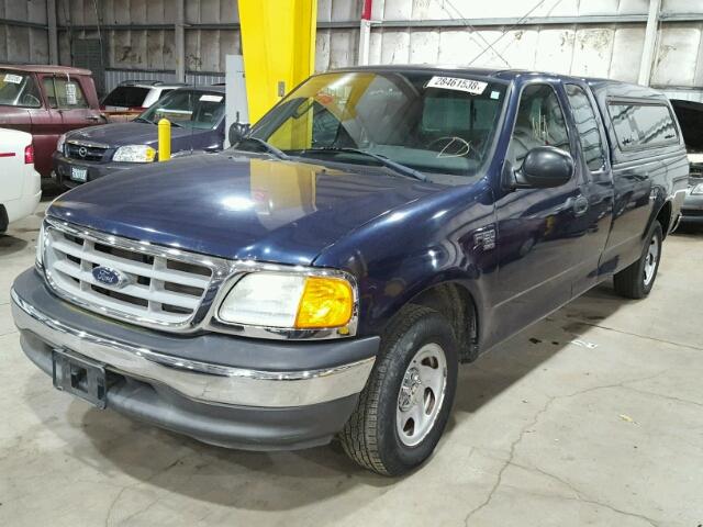 2FTRX17W04CA29774 - 2004 FORD F-150 HERI BLUE photo 2