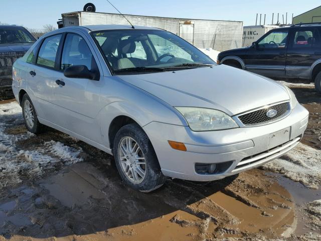 1FAFP34NX5W250725 - 2005 FORD FOCUS ZX4 SILVER photo 1