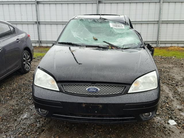 1FAHP38Z66W119556 - 2006 FORD FOCUS ZX4 BLACK photo 10