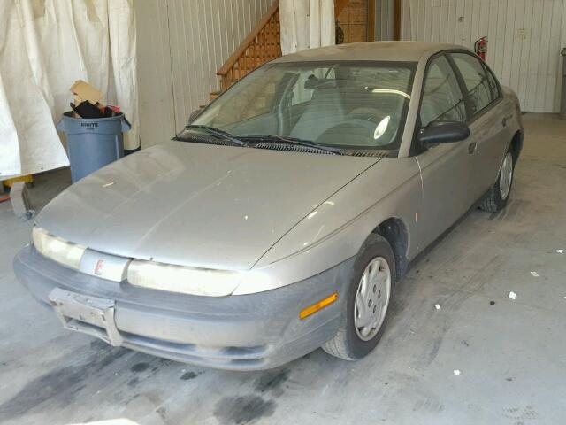 1G8ZF5281XZ178487 - 1999 SATURN SL GRAY photo 2