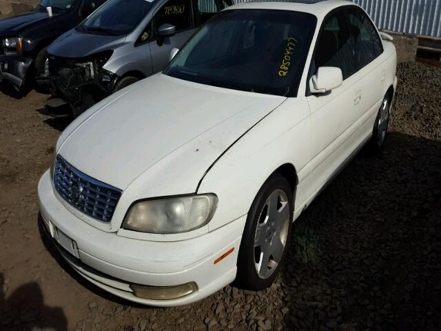 W06VR54R1YR128046 - 2000 CADILLAC CATERA WHITE photo 2