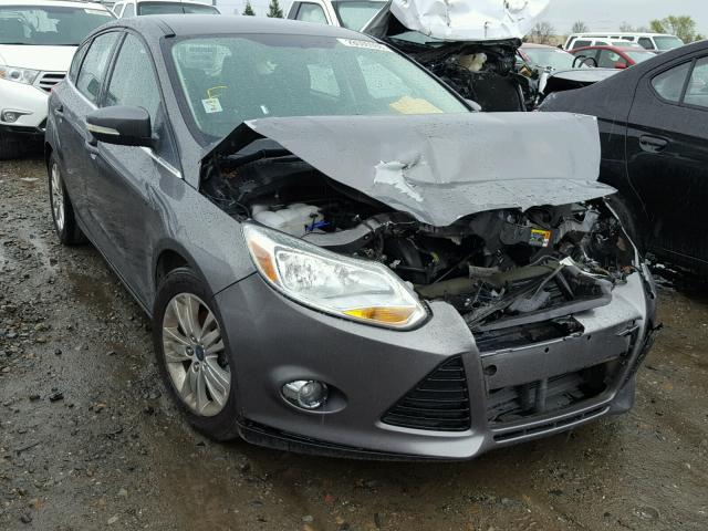 1FAHP3M2XCL453823 - 2012 FORD FOCUS SEL GRAY photo 1