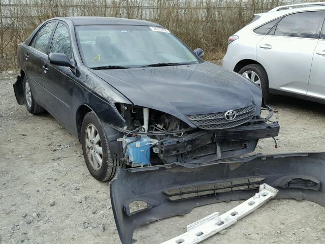 JTDBF30K020075519 - 2002 TOYOTA CAMRY LE BLACK photo 1