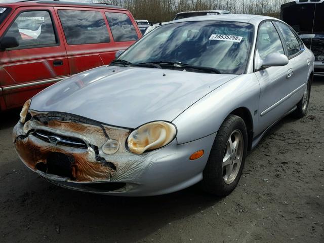 1FAFP53S7XG244137 - 1999 FORD TAURUS SE GRAY photo 2