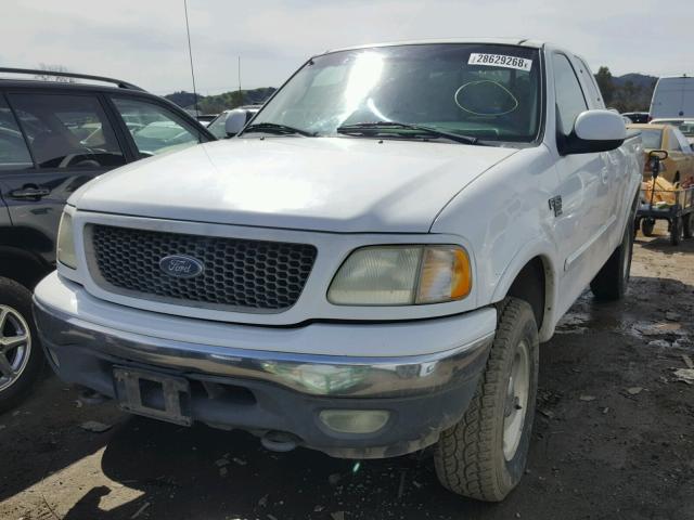 1FTRX18LXYKA23003 - 2000 FORD F150 WHITE photo 2