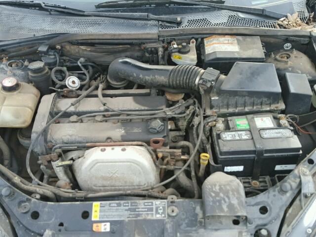 1FAFP3438YW293026 - 2000 FORD FOCUS SE BLACK photo 7