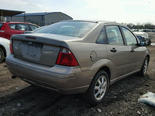 1FAHP34N15W281502 - 2005 FORD FOCUS ZX4 TAN photo 4