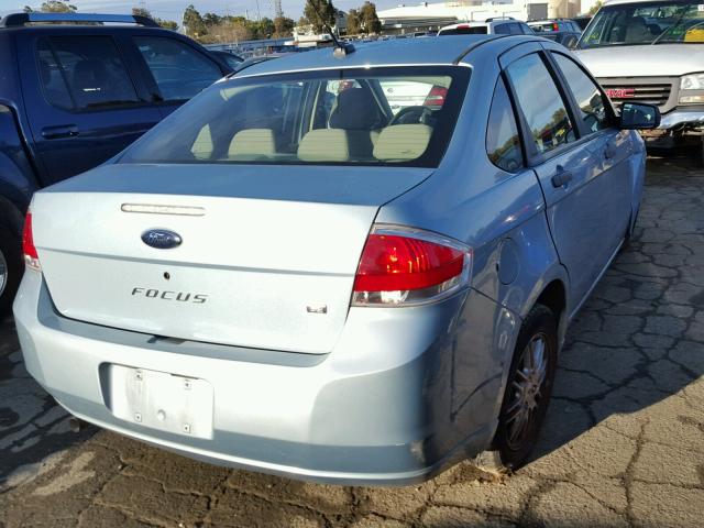 1FAHP35N79W104960 - 2009 FORD FOCUS SE BLUE photo 4