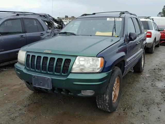 1J8GW58N12C144497 - 2002 JEEP GRAND CHER BLUE photo 2