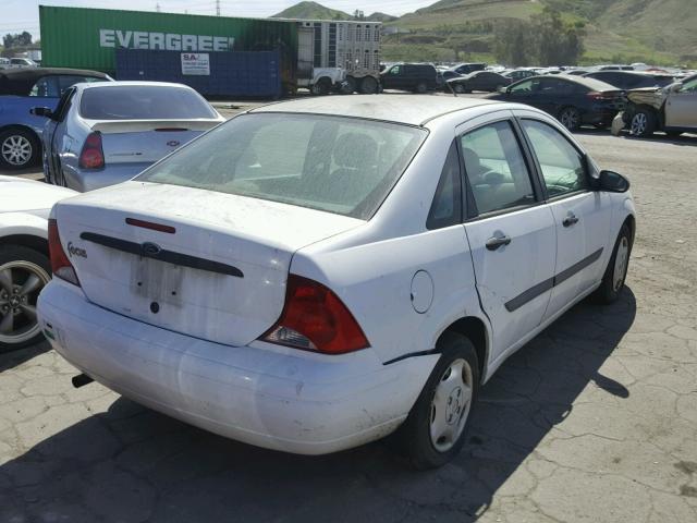 1FAFP33P33W198869 - 2003 FORD FOCUS LX WHITE photo 4