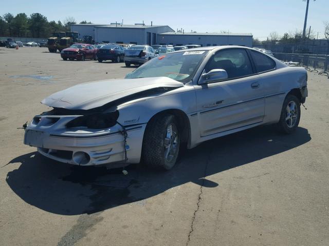 1G2NW12E52C181203 - 2002 PONTIAC GRAND AM G SILVER photo 2