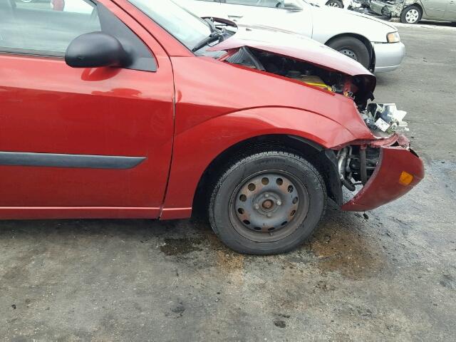 1FAFP33Z64W204067 - 2004 FORD FOCUS LX RED photo 10