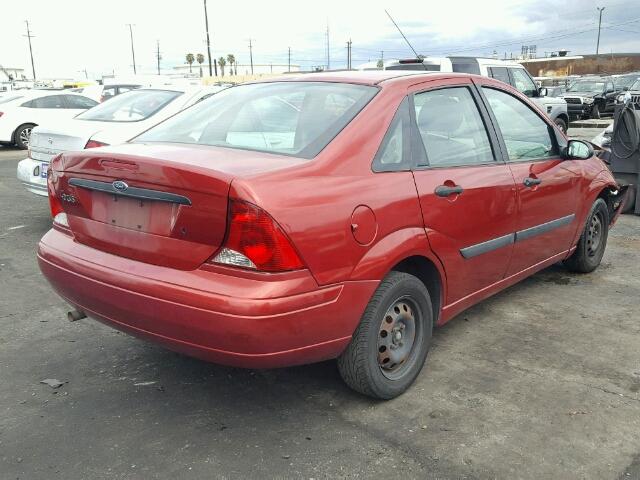 1FAFP33Z64W204067 - 2004 FORD FOCUS LX RED photo 4