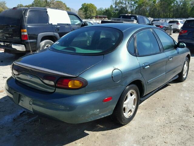 1FALP52UXVG310764 - 1997 FORD TAURUS GL GREEN photo 4